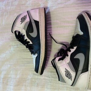 Women’s Black and White Air Jordan 1 Mid Trainers